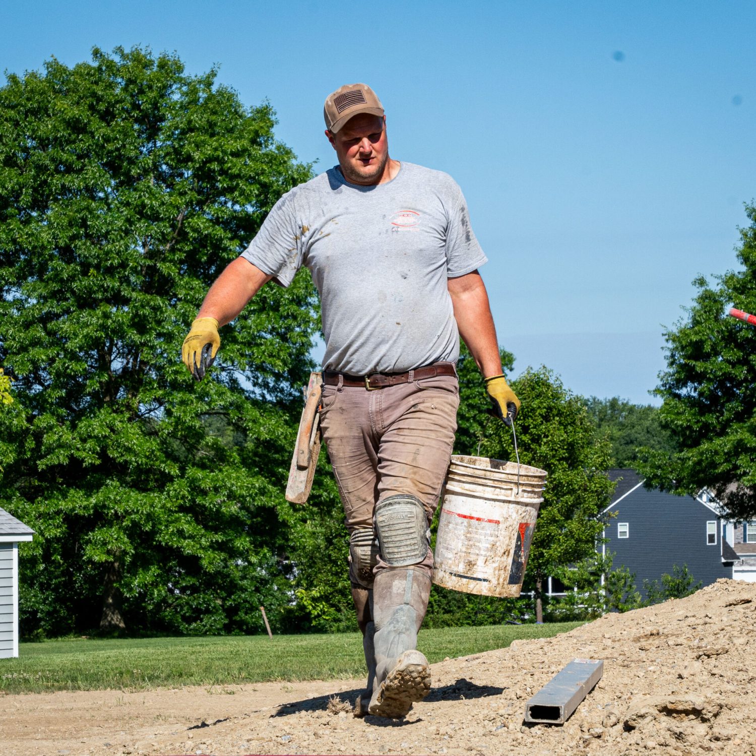 Construction Workers at Stamped Concrete Pool Deck